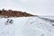 Winter landscape with a Bicycle on the frozen river. The Ob Rive