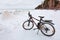 Winter landscape with a Bicycle on the frozen river. The Ob Rive