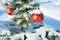 Winter landscape with Christmas fir tree decoration red ball and