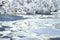 Winter landscape of the Dnepr river , covered with ice, snow and hoarfrost.