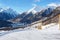 Winter landscape of the Engadine valley in a sunny morning,  Guarda, Lower Engadine, Graubunden, Switzerland.  View from the road