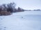 Winter landscape frozen lake snowy trees