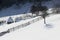 Winter landscape in Fundata village from Rucar Bran pass in Romania at the bottom of Bucegi Mountains