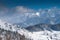 Winter landscape in Fundata village from Rucar Bran pass in Romania at the bottom of Bucegi Mountains