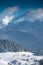 Winter landscape in Fundata village from Rucar Bran pass in Romania at the bottom of Bucegi Mountains