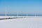 Winter landscape with highway and windturbines