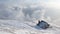 Winter landscape with a house on the mountain with haze and snow