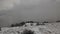 Winter landscape in mountains with clouds