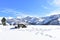 Winter landscape with mountains and snowy viewpoint with stone table and benches covered with snow. Lugo, Galicia, Spain