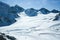 Winter landscape - Panorama of the ski resort with ski slopes. Alps. Austria. Pitztaler Gletscher. Wildspitzbahn