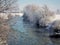 Winter landscape and river with flowing floes