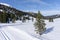 Winter landscape with a road with a cross-country trail in the Schonfeld area, Salzburger Lungau, Austria, Europe.