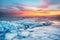 Winter landscape on seashore during sunset. Lofoten islands, Norway.