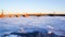 Winter landscape with the setting sun and the ice on the river. Winter In Saint Petersburg. The Neva river to the Peter and Paul f