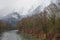 Winter landscape with snow covered Grimming mountain and Enns river in Ennstal, Steiermark, Austria