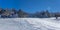 Winter landscape with snow slope for sledding, tubing and Snowmobiling in the early morning