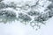 Winter landscape with snowy riverbank and river covered with cracked ice and snow. aerial top view