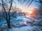 Winter landscape with snowy trees, ice, beautiful frozen river