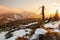 Winter landscape, sunset warm light in snowy Czech mountains with trees, Orlicke mountains, Czech republic. Beautiful winter