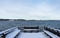 Winter landscape of the Swedish coast. Beautiful wooden pier with benches for people relaxing.