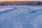 winter landscape, tire tracks on the snow, snow road