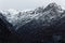 Winter landscape. Trees, mountains, sky and clouds covered with fresh snow. Italy, Alagna