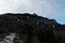 Winter landscape. Trees, mountains, sky and clouds covered with fresh snow. Italy, Alagna