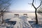 Winter landscape with two benches