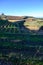 Winter landscape with view on terraced vineyards located above clouds level on mountains slopes near village Puntagorda, north