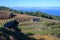 Winter landscape with view on terraced vineyards located above clouds level on mountains slopes near village Puntagorda, north