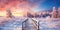 Winter landscape with wooden path at sunset. Winter nature background