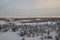 Winter landskape with forest in snow in the evening sunset. North