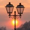 Winter lantern and evening sunset