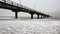 Winter With Long Bridge On Baltic Sea