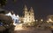 Winter Minsk at night. Christmas in Minsk, Belarus. Cityscape of Belarus capital. Famous church orthodox tower in center of city