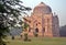 A winter morning sun lighting the Shisha Gumbad monument