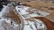 Winter mountain and hillside landscape, drone aerial view with snow, patterns, shapes and trees