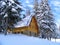 Winter mountain house and forest