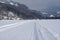 Winter mountain landscape with groomed cross-country trails