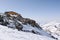 Winter mountain landscape in the Monte Rosa range in Switzerland with the Mantova mountain hut