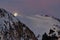 Winter mountain landscape, at night. The Piatra Mare Mountains in the light of the moon, landmark attraction in Romania