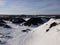 Winter mountain landscape. Sunny day, snow on the ground.