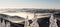 Winter mountain panorama with many mountain ranges, mist and clear sky above from hiking trail bellow Lysa hora hill in