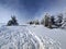 Winter in the mountains. Hiking during wintertime. Snow storm in the high mountains