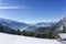 Winter mountains landscape track and blue sky in sunny day