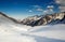 Winter mountains panorama with ski slopes and ski lifts.