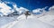 Winter mountains panorama with ski slopes and ski lifts.