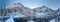 Winter mountains. Scenic frosty mountain landscape. Mountain icy lake. Winter panorama of Tatra mountains in Morskie Oko lake,