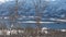 Winter norwegian panorama with the houses on a sea shore