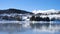 Winter nothern mountains and snowed ocean shore